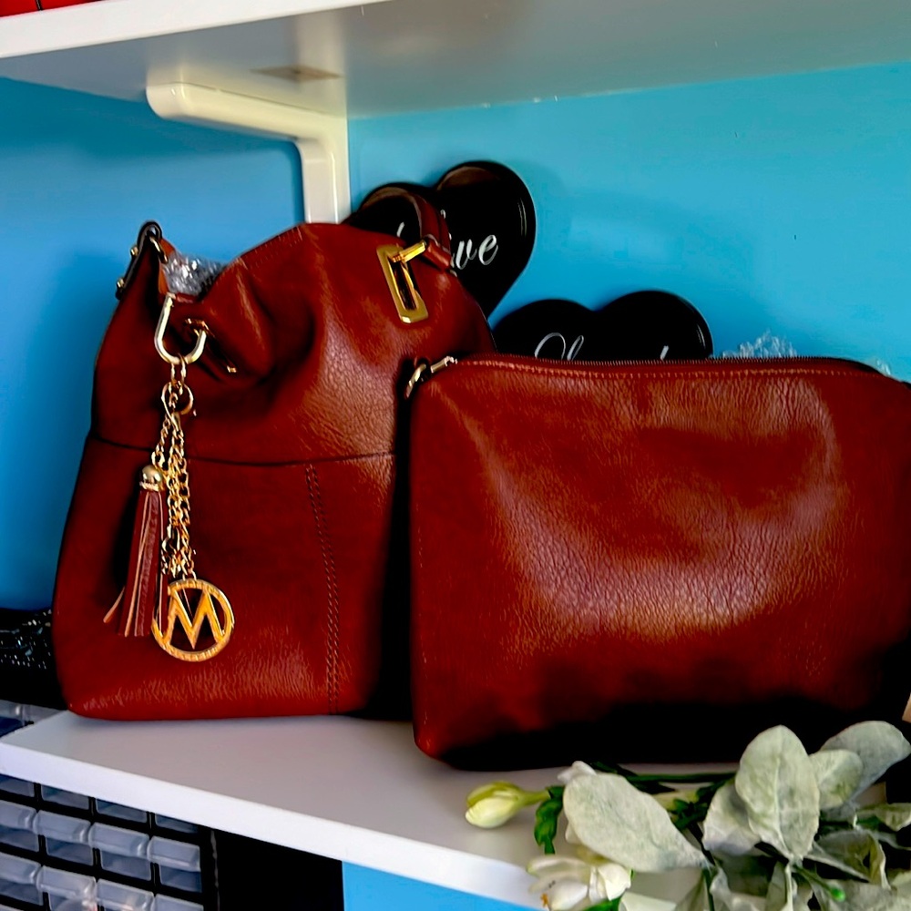 Mia Farrow brand brown tote with matching cosmetic/travel bag.